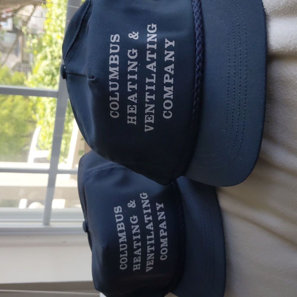 2 Vintage SKM Columbus Heating &Vent Co. corded leather strap back baseball caps